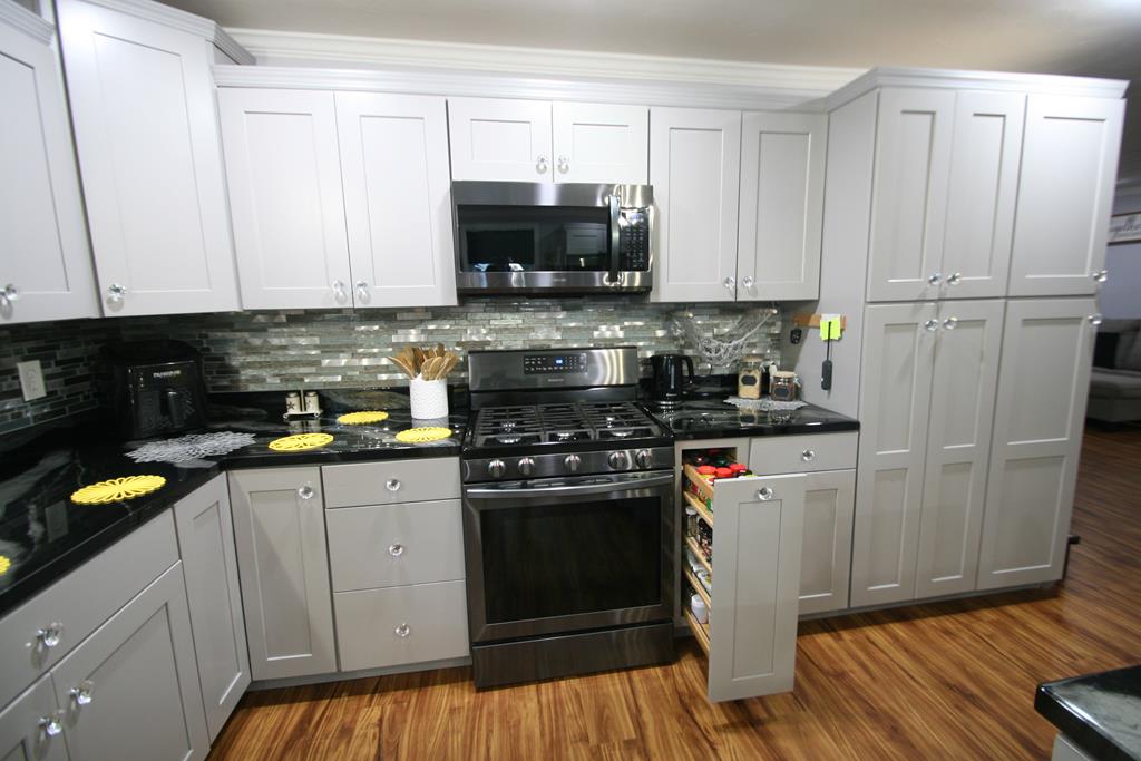 Kitchen w Pull Out Spice Rack and Pantry